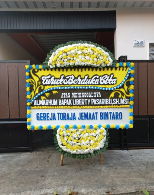 Papan Bunga Duka di Pakasai